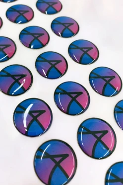 Купить наклейку заливную 2х2 см, с нанесением "Символ А"