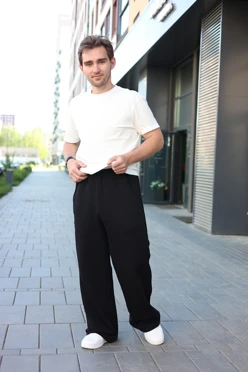 Купить брюки Льюис из футера унисекс, однотонные черные