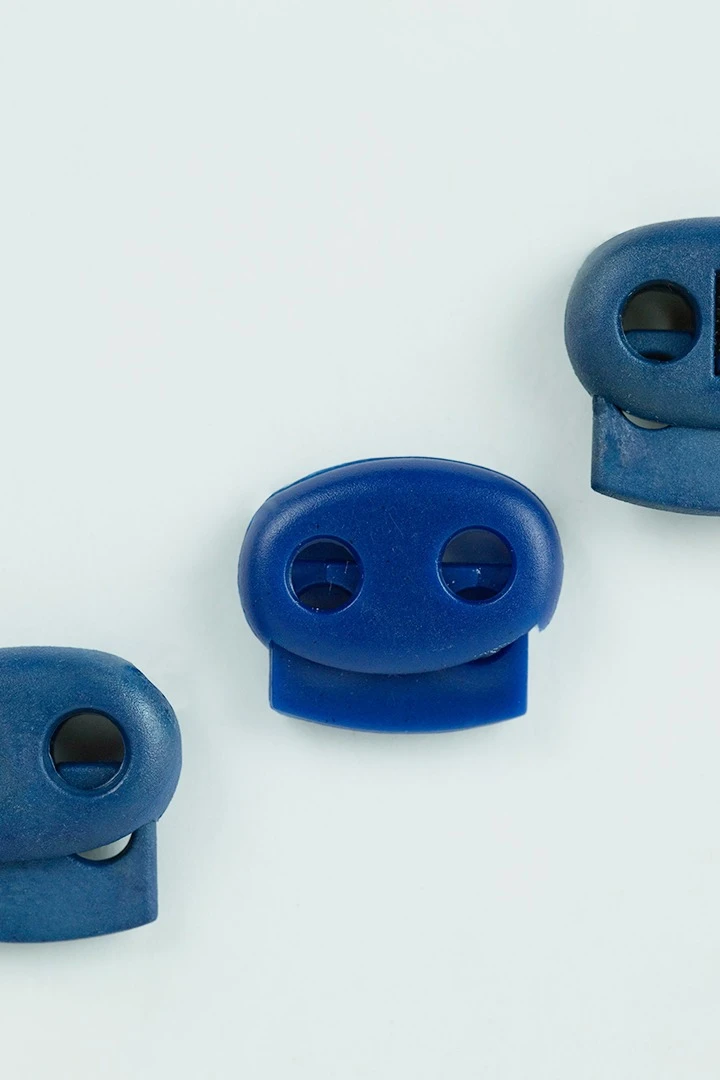 Фиксатор пластиковый с двумя отверстиями 23х19 мм#1