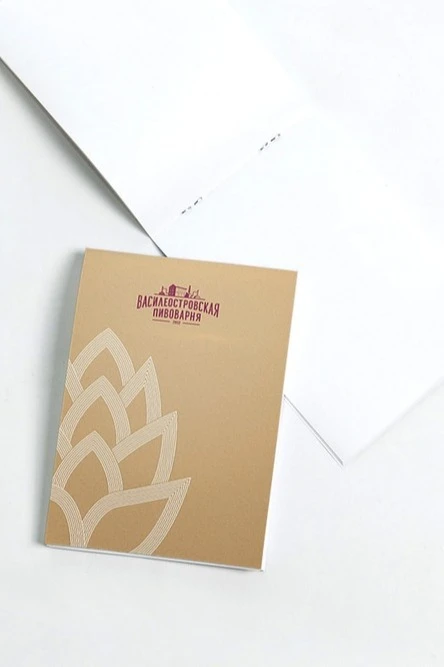 Купить блокнот А7 фирменный на скобе (20 листов белые)