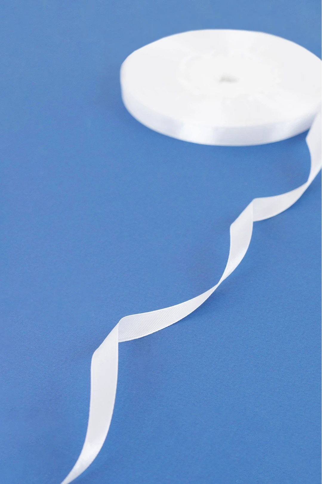 Купить ленту атласную шириной 1 см, однотонную (для сублимации)