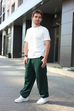 Купить брюки Льюис из футера унисекс, однотонные зеленые