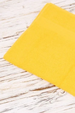 Купить полотенце махровое 50х90 см желтое