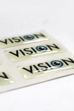 Купить наклейку заливную 3х1 см, с нанесением "Vision"