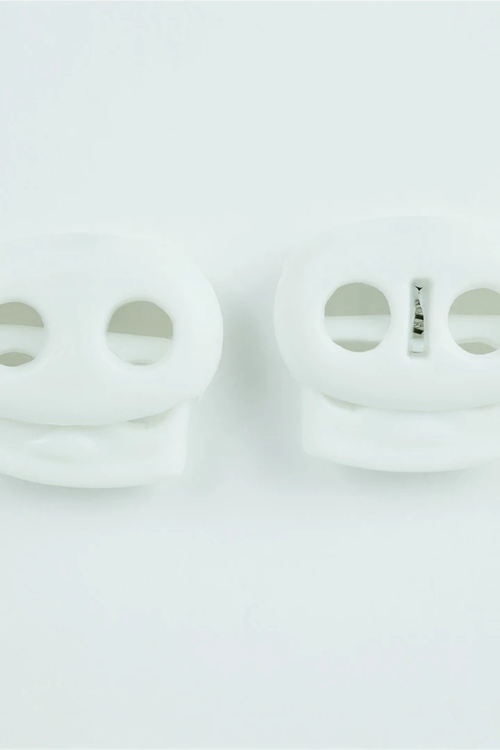 Фиксатор пластиковый с двумя отверстиями 23х19 мм#3